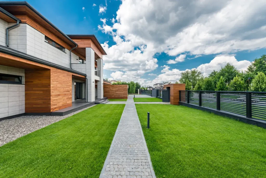 Open back yard of a residential property with the grass kept in order